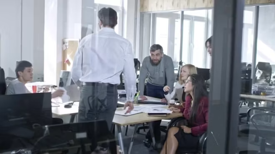 Business team reviewing supplier, procurement and risk information.
